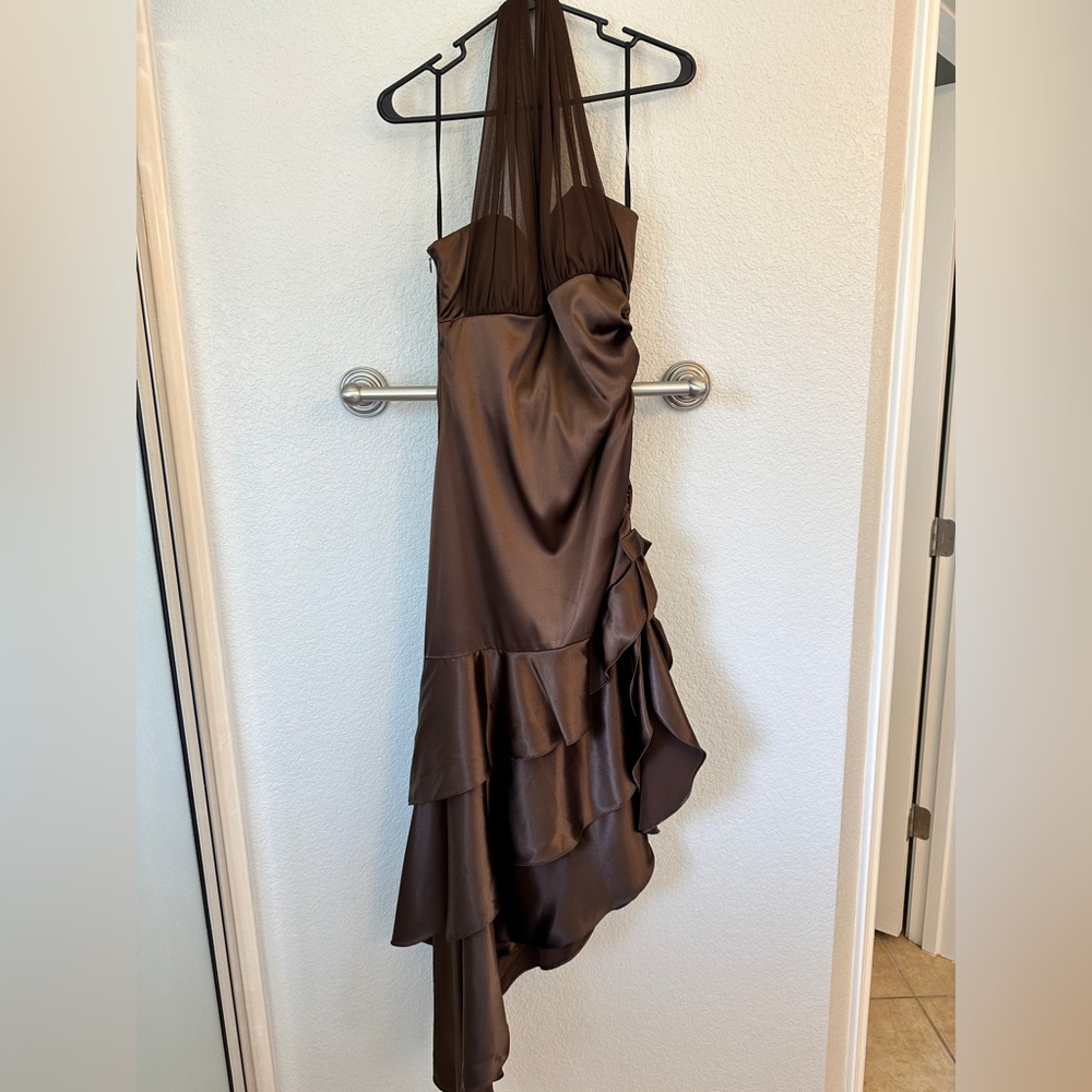 Brown halter dress. High low from left to right.